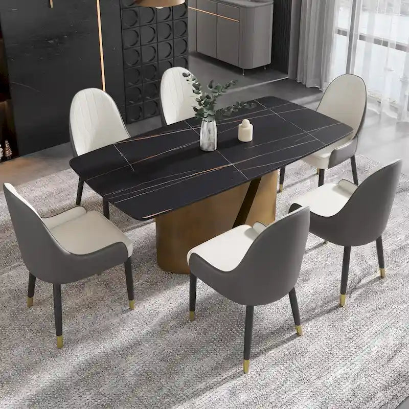 Table de salle à manger en pierre frittée Pandora noire/blanche avec pieds en métal doré, 6 à 8 places