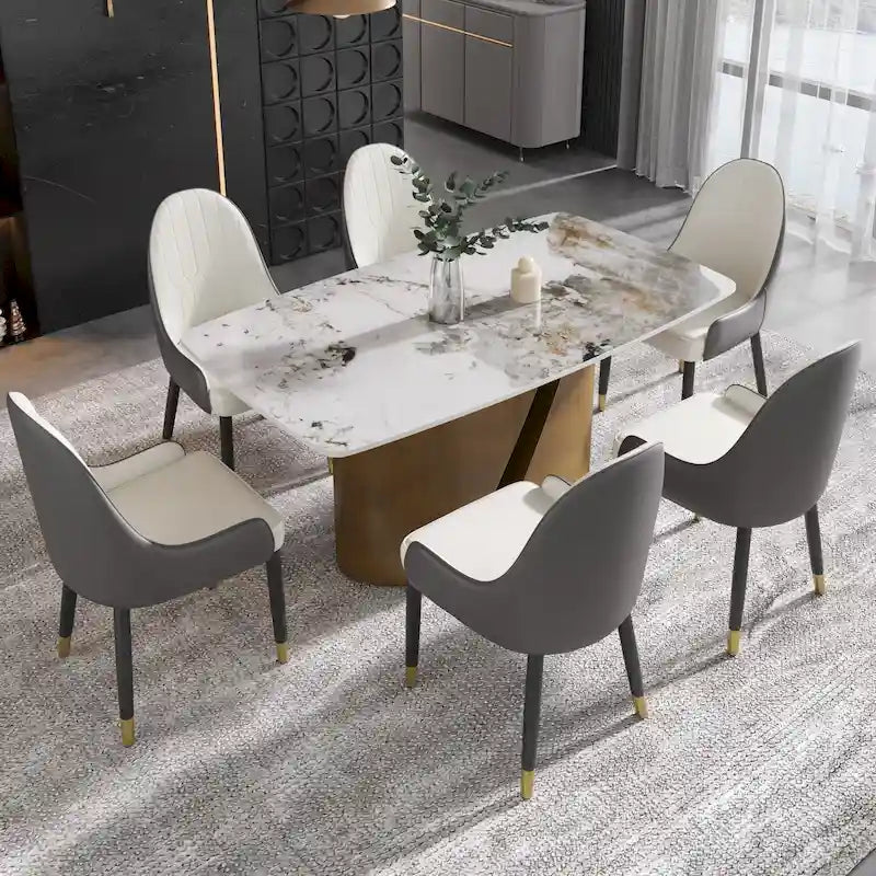 Table de salle à manger en pierre frittée Pandora noire/blanche avec pieds en métal doré, 6 à 8 places