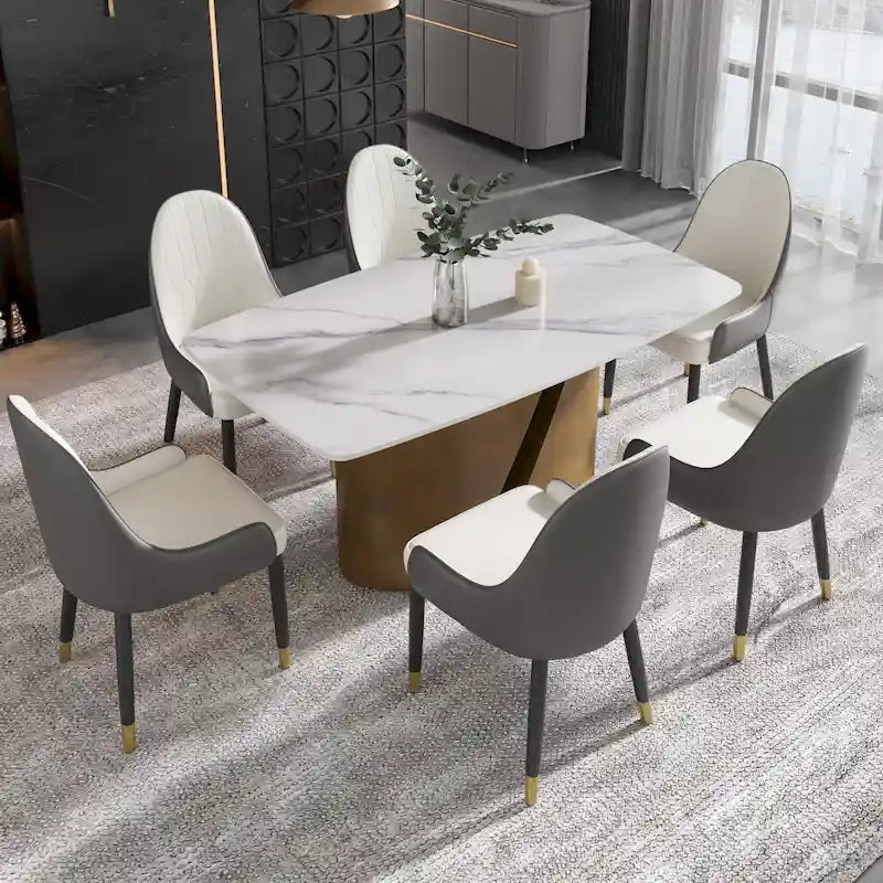 Table de salle à manger en pierre frittée Pandora noire/blanche avec pieds en métal doré, 6 à 8 places