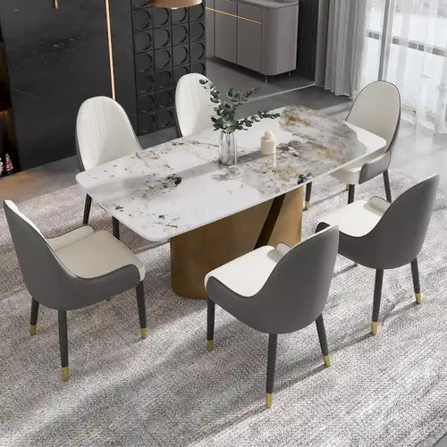 Table de salle à manger en pierre frittée Pandora noire/blanche avec pieds en métal doré, 6 à 8 places