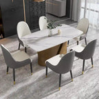 Table de salle à manger en pierre frittée Pandora noire/blanche avec pieds en métal doré, 6 à 8 places