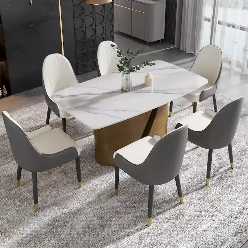 Table de salle à manger en pierre frittée Pandora noire/blanche avec pieds en métal doré, 6 à 8 places