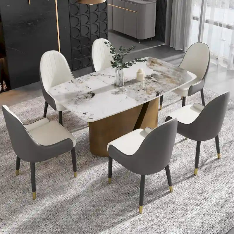Table de salle à manger en pierre frittée Pandora noire/blanche avec pieds en métal doré, 6 à 8 places